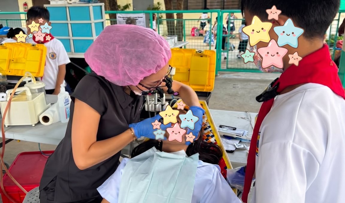 Dr Celeste Ling treating a child at a community dental outreach